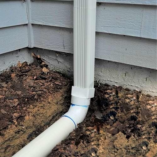Brown Roofing Company, Inc. installs gutter downspout extensions in Shelton, Trumbull, Southbury